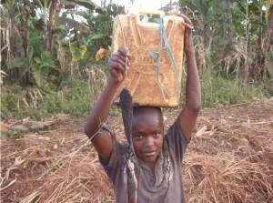 Girl transporting water